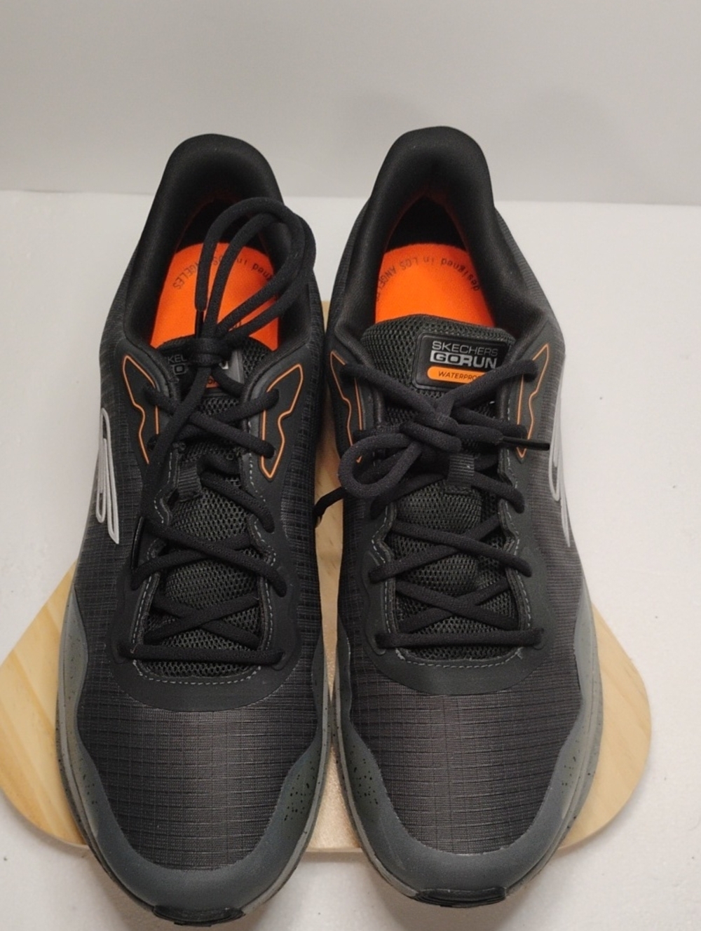 Skechers Men's Black Athletic Running Shoes with Orange Accents